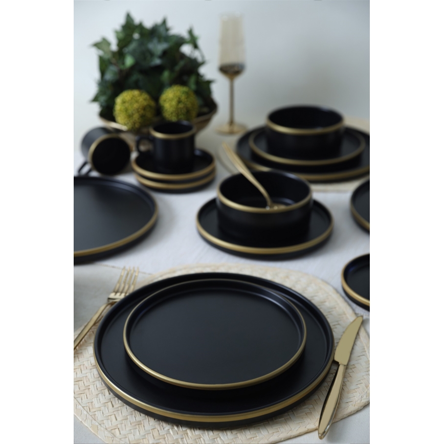 20-teiliges Tafelservice in Schwarz/Gold aus Steingut