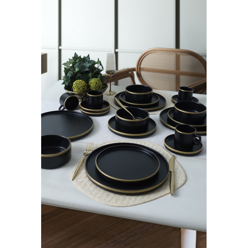 20-teiliges Tafelservice in Schwarz/Gold aus Steingut