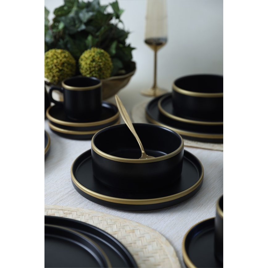 20-teiliges Tafelservice in Schwarz/Gold aus Steingut