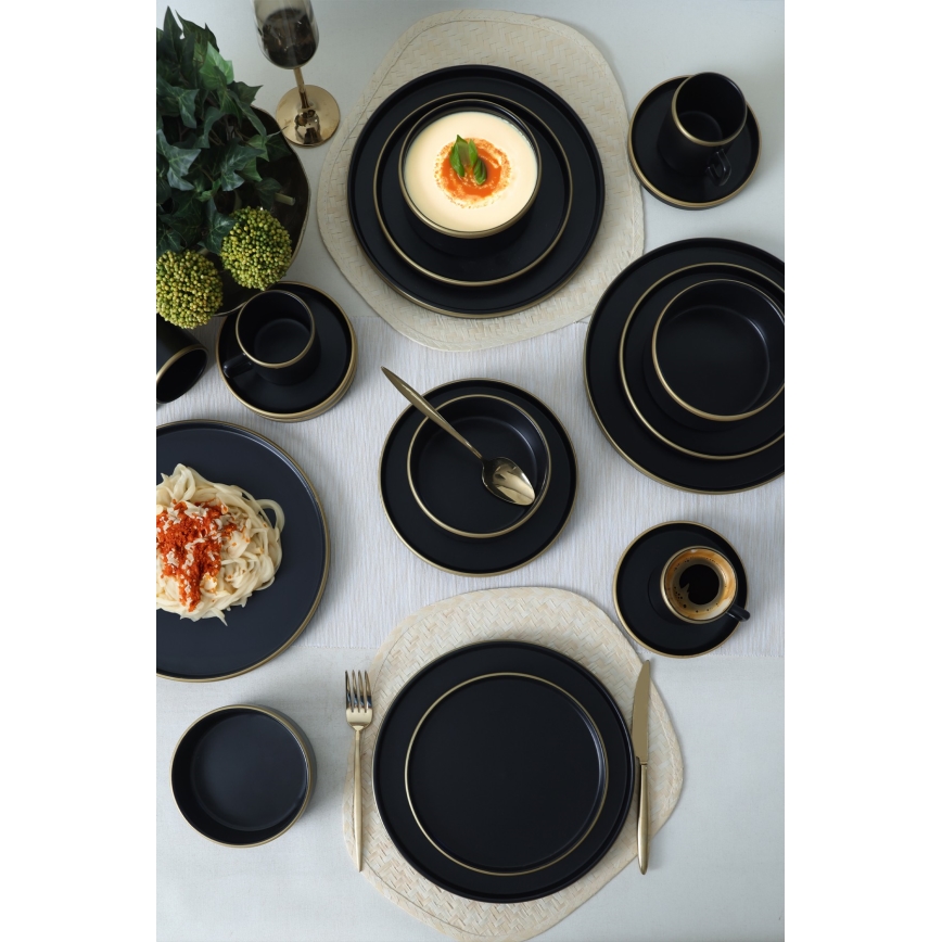 20-teiliges Tafelservice in Schwarz/Gold aus Steingut