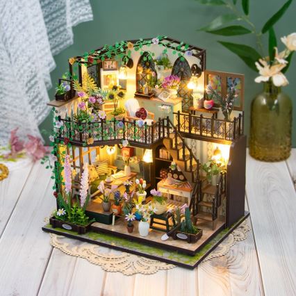 2Kids Toys - Miniatura della casetta Darcyin casa dei fiori 2xAAA