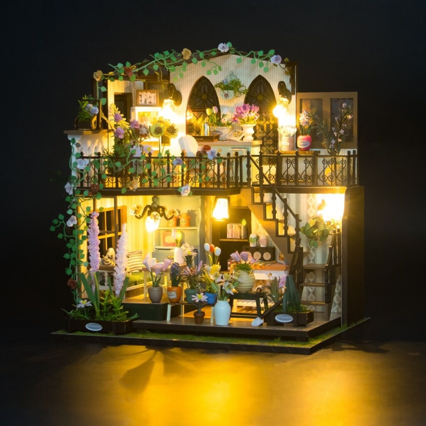 2Kids Toys - Miniatura della casetta Darcyin casa dei fiori 2xAAA