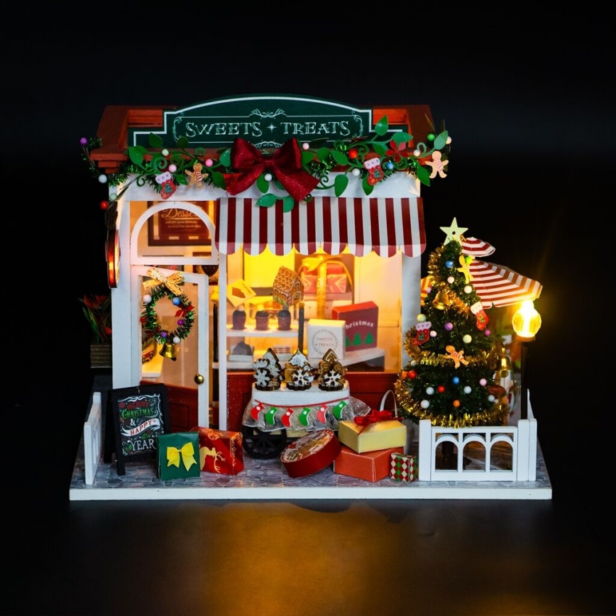 2Kids Toys - Miniatura della casetta Pasticceria di Natale 2xAAA