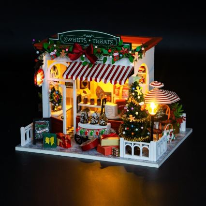 2Kids Toys - Miniatura della casetta Pasticceria di Natale 2xAAA