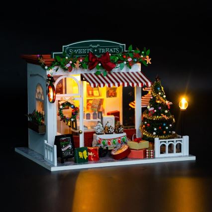2Kids Toys - Miniatura della casetta Pasticceria di Natale 2xAAA