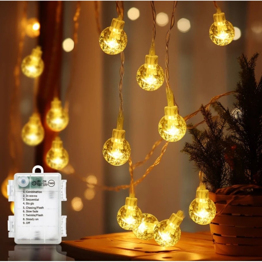 Aigostar - Catena LED natalizia da esterno 100xLED/3xAA/8 funzioni 10,3 m IP44 bianco caldo