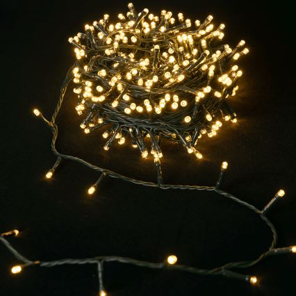 Aigostar - Catena luminosa natalizia per esterni 100 LED/8 funzioni 3xAA 5,3 m IP44 bianco caldo