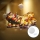 Aigostar - Décoration de Noël LED/3xAAA Père Noël et ses rennes 13,4cm