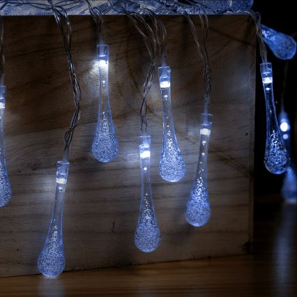 Aigostar - Guirlande LED d'extérieur 25 LED, 8 modes, 3 piles AA, 2,5 m, IP44, blanc froid, gouttes