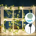 Aigostar - Guirlande solaire 100xLED/12m IP65 300 mAh blanc chaud eucalyptus