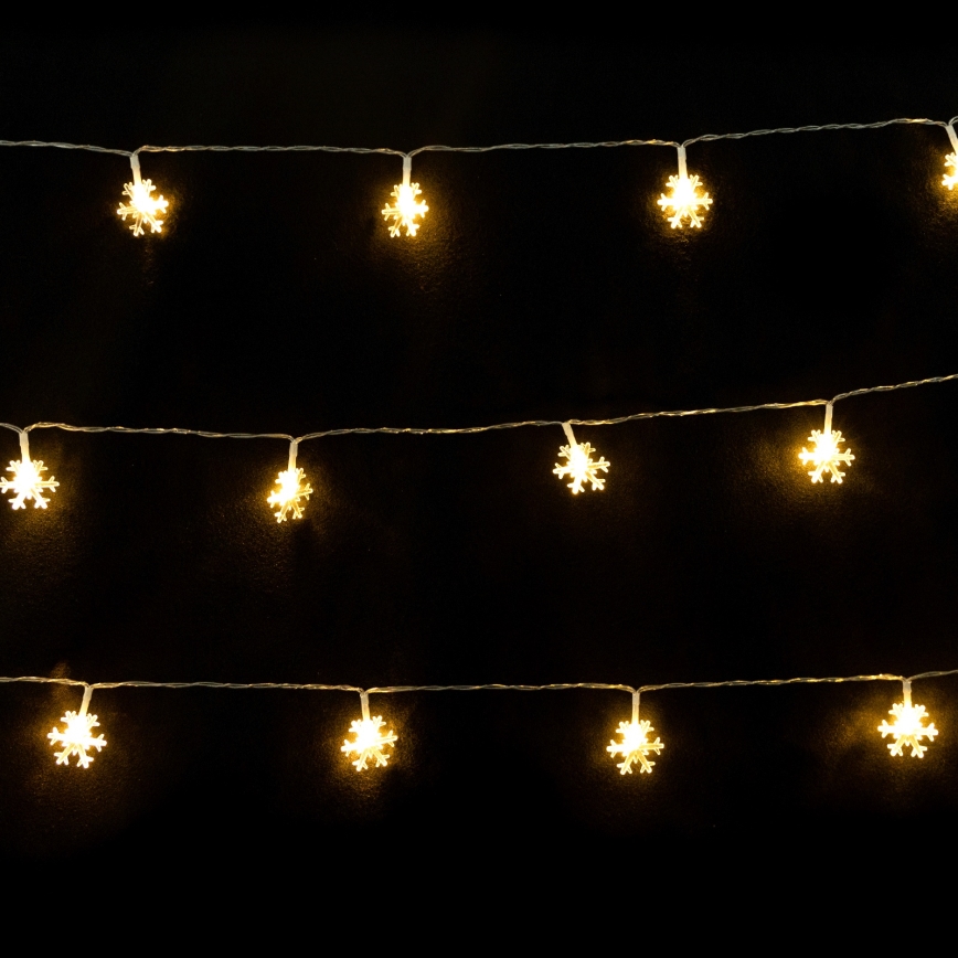 Aigostar - LED-Lichterkette 10xLED/3xAA 1,5m warmweiß Schneeflocken