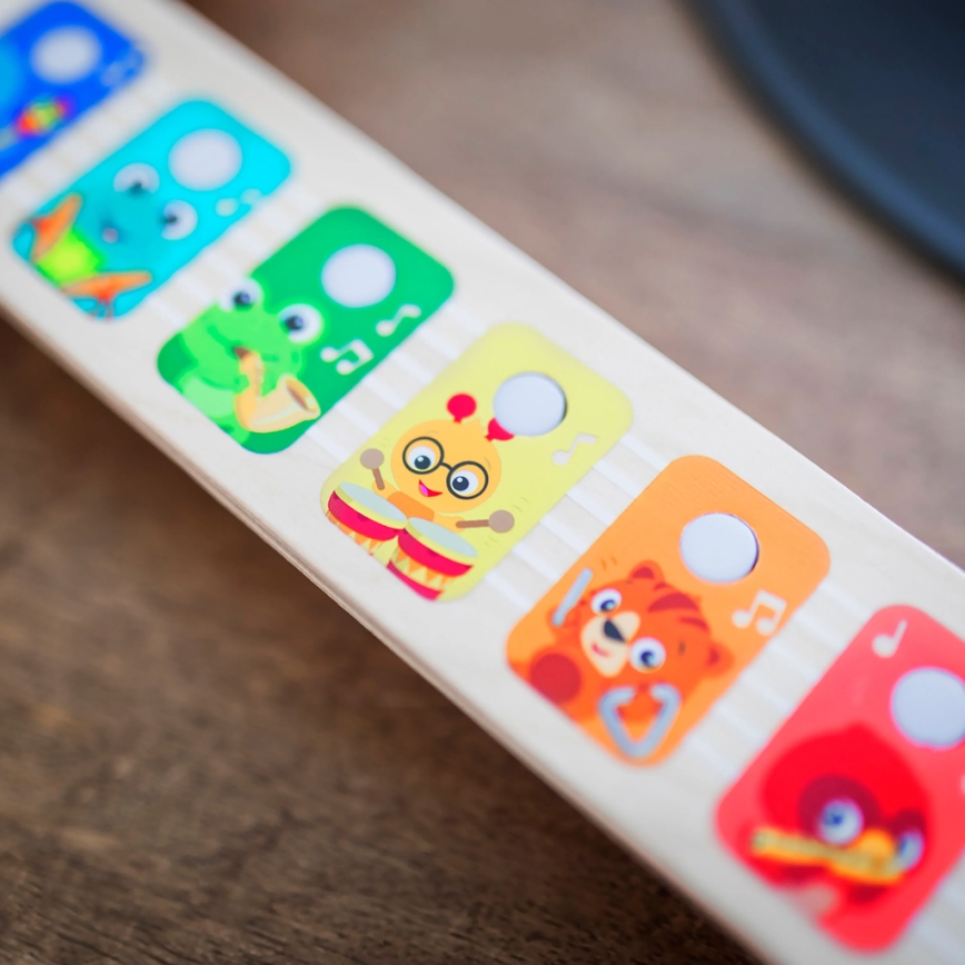 Baby Einstein - Chitarra giocattolo musicale in legno MAGIC TOUCH (3x AA)