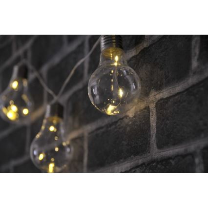 Catena luminosa decorativa a LED SMOLDER, 2,1 m — 10 LED, alimentata da 2 batterie AA