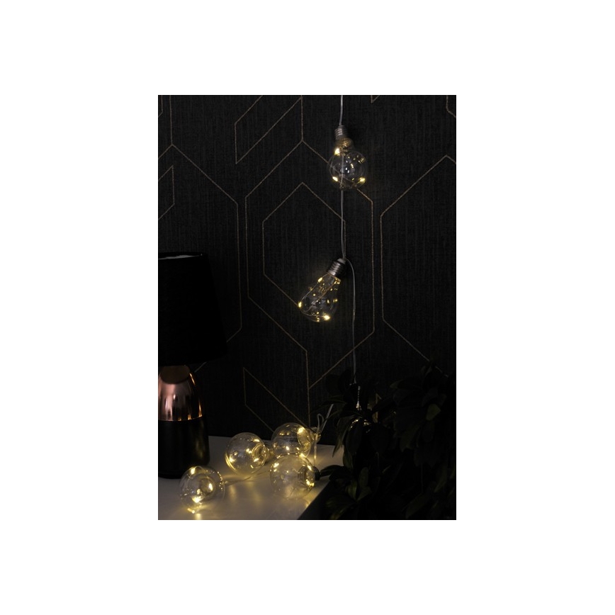 Catena luminosa decorativa a LED SMOLDER, 2,1 m — 10 LED, alimentata da 2 batterie AA