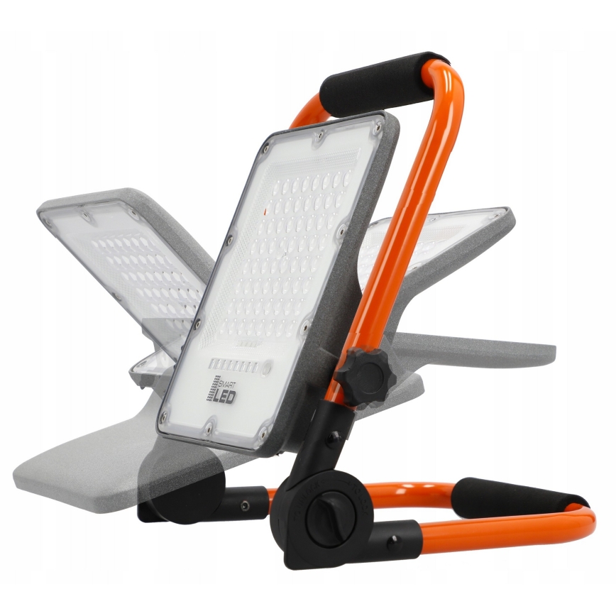 Faretto LED ricaricabile con treppiede LED/100W/3,2V 5000K 5000 mAh IP65 arancione
