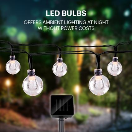 Grundig - LED Solar-Lichterkette 50xLED/8 Funktionen 6,9 m warmweiß 600 mAh