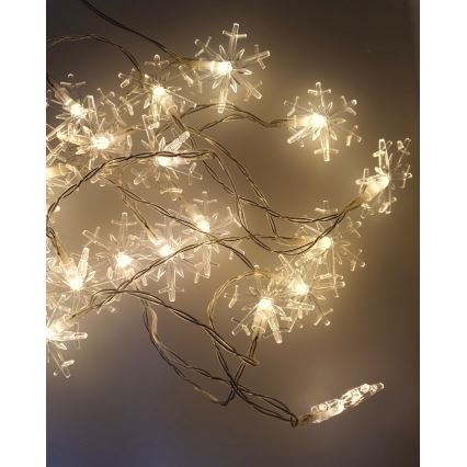 Guirlande de Noël LED d'extérieur 20xLED/2xAA 2,2 m IP44, blanc chaud, à motifs flocons de neige