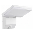 Lampada a parete per esterni LED con sensore di movimento LED/18W/230V IP44 bianco