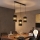 Lampadario LED sospeso con cavo BOGART 3xE27/15W/230V nero/oro
