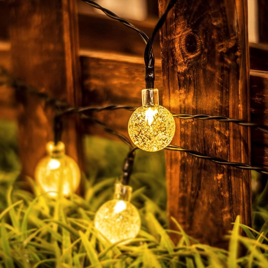 LED-Solar-Deko-Lichterkette 50xLED/8 Funktionen 500 mAh 9,5 m IP67 warmweiß