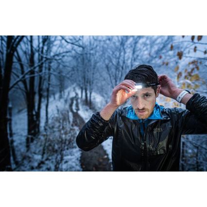 Ledlenser NEO9R - Lampe frontale rechargeable à LED à intensité réglable LED/5000 mAh IP54 1200 lm 120h noir/bleu