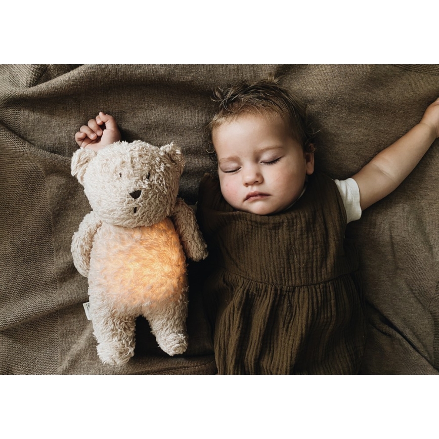 Moonie - Compagno di coccole con melodia e luce orsacchiotto 2.0 organic cappuccino