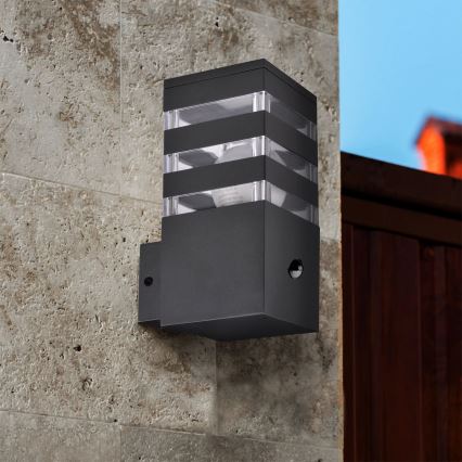 Outdoor-Wandleuchte mit Sensor TEKSAS 1xE27/12W/230V IP44 Graphit