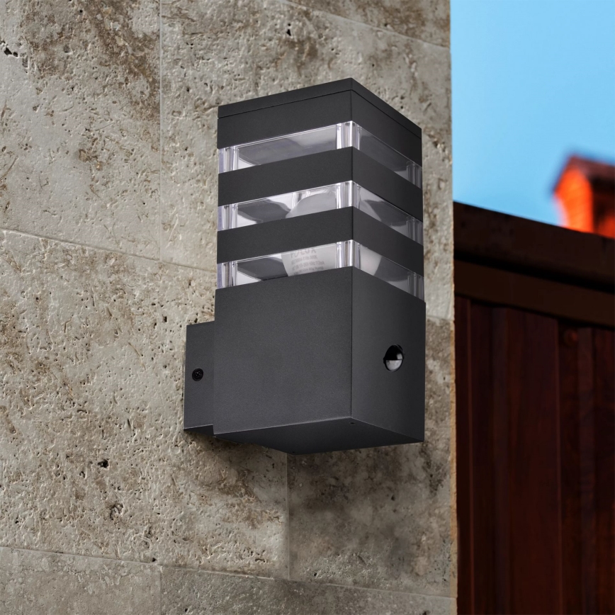 Outdoor-Wandleuchte mit Sensor TEKSAS 1xE27/12W/230V IP44 Graphit