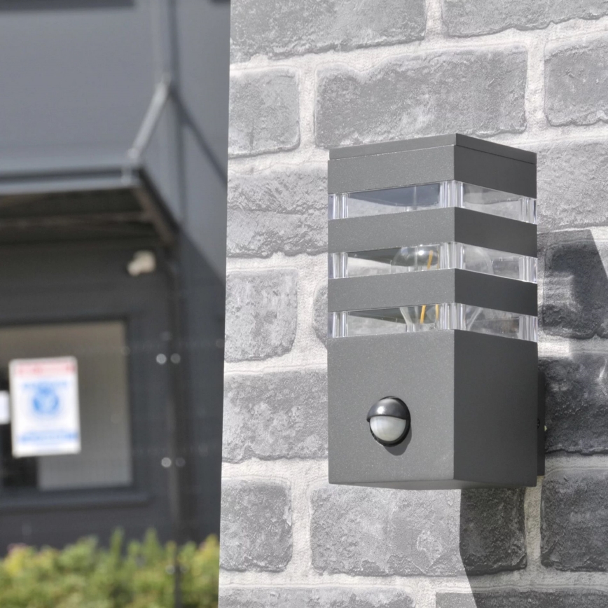 Outdoor-Wandleuchte mit Sensor TEKSAS 1xE27/12W/230V IP44 Graphit