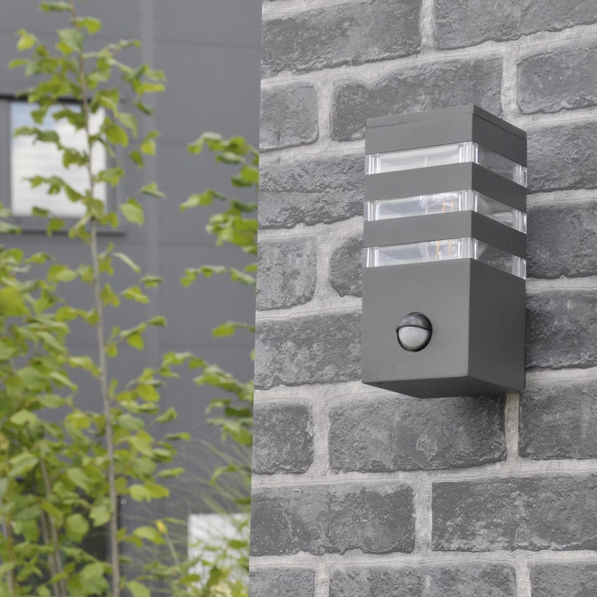 Outdoor-Wandleuchte mit Sensor TEKSAS 1xE27/12W/230V IP44 Graphit