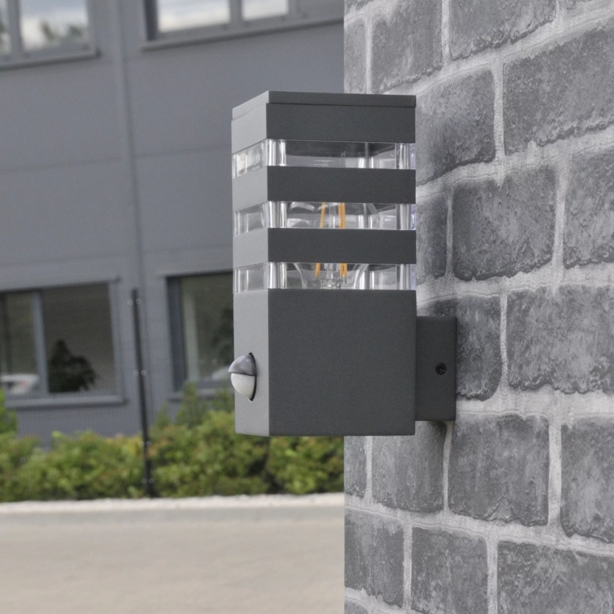 Outdoor-Wandleuchte mit Sensor TEKSAS 1xE27/12W/230V IP44 Graphit