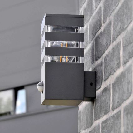 Outdoor-Wandleuchte mit Sensor TEKSAS 1xE27/12W/230V IP44 Graphit