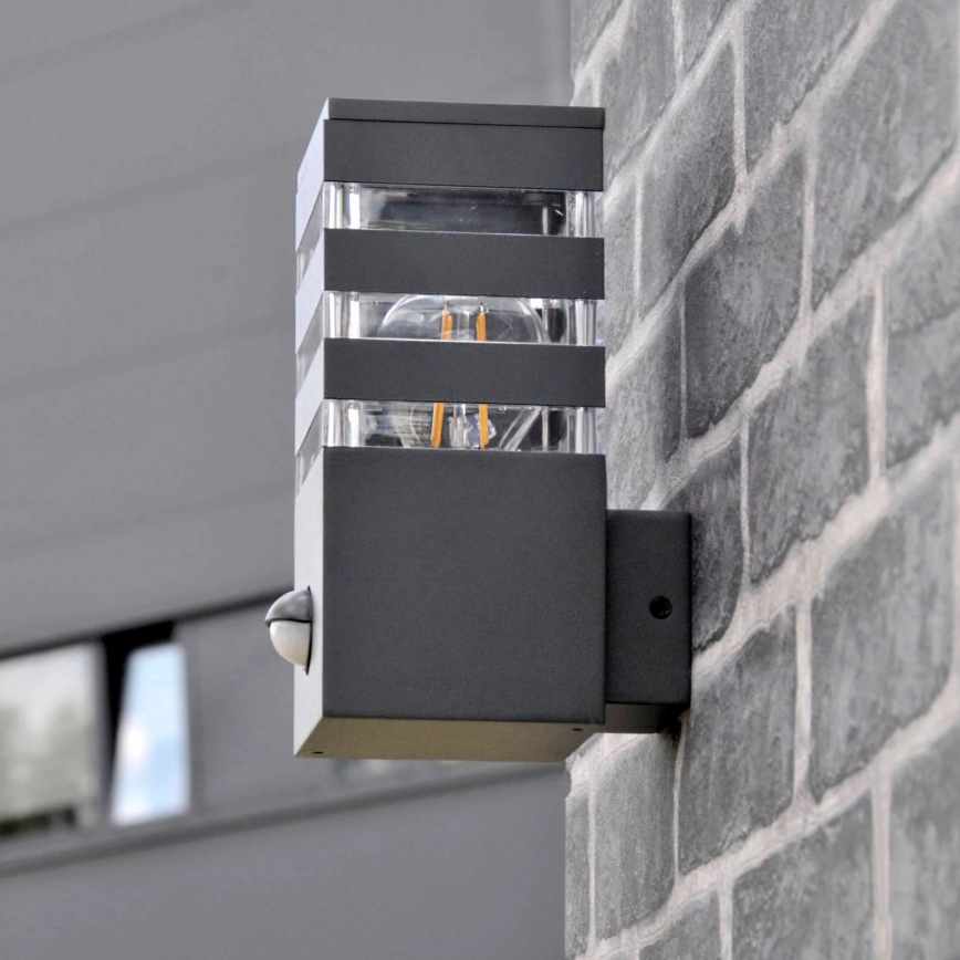 Outdoor-Wandleuchte mit Sensor TEKSAS 1xE27/12W/230V IP44 Graphit