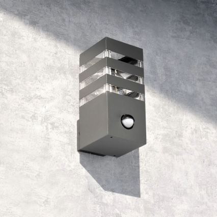 Outdoor-Wandleuchte mit Sensor TEKSAS 1xE27/12W/230V IP44 Graphit