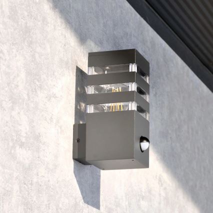 Outdoor-Wandleuchte mit Sensor TEKSAS 1xE27/12W/230V IP44 Graphit