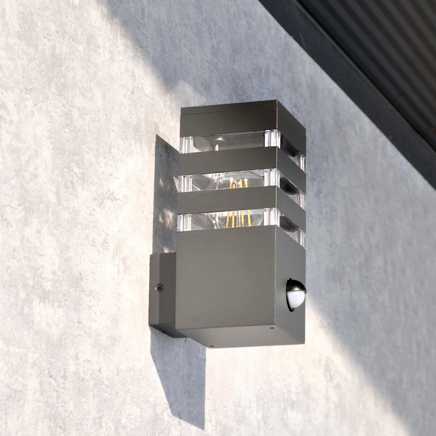 Outdoor-Wandleuchte mit Sensor TEKSAS 1xE27/12W/230V IP44 Graphit