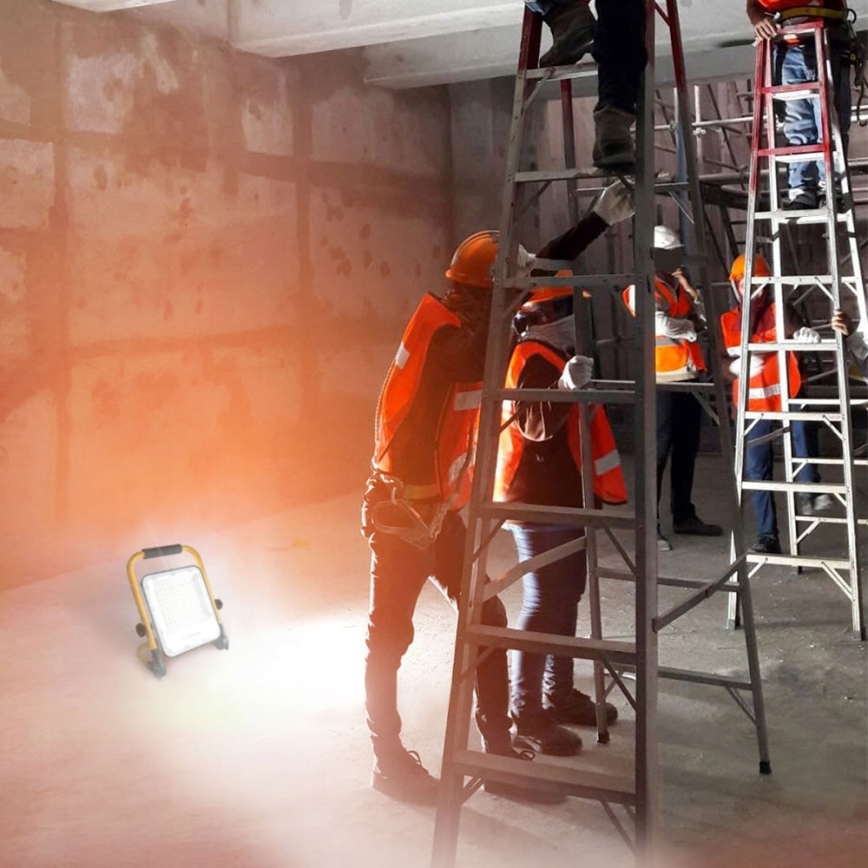 Proiettore ricaricabile a LED con supporto LED/100W/3,2V 4500K 15000 mAh IP65 arancione