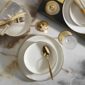 Service de table 16 pièces en porcelaine blanche et dorée