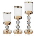 Set da 3 portacandele dorati