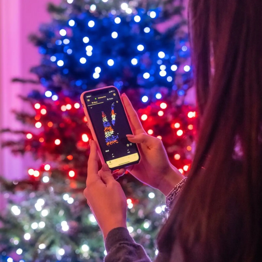 Twinkly - Dimmbare LED-RGBW-Weihnachtskette für den Außenbereich STRINGS 250xLED 23,5m IP44 Wi-Fi